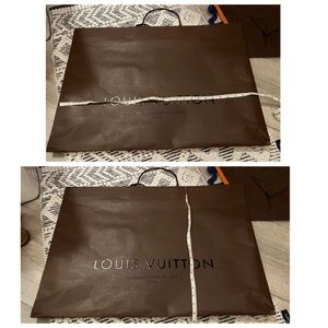 Bundle of Louis Vuitton shopping bags